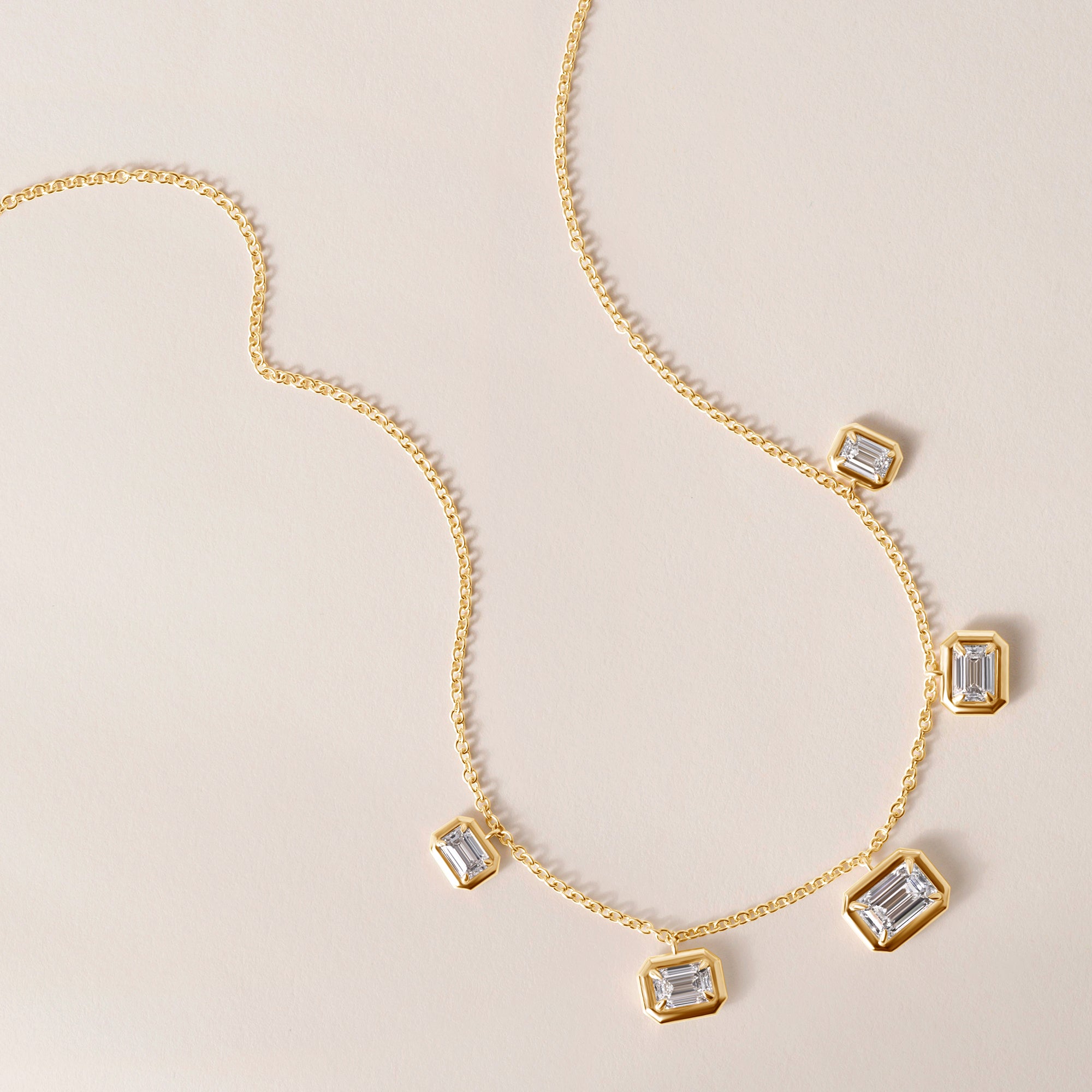 Horizontal Graduated Emerald Cut Stella Bezel Necklace