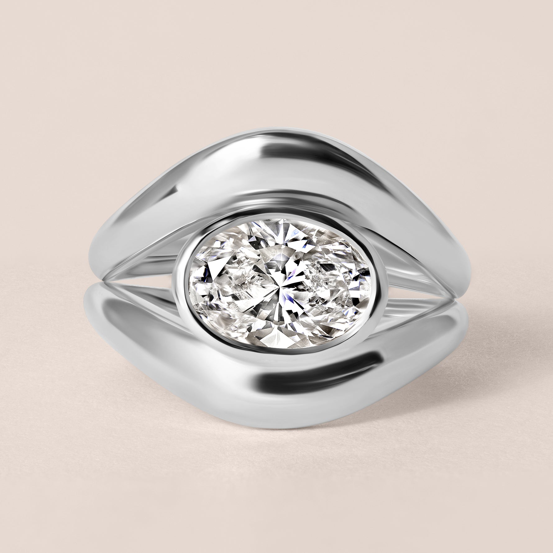 Top-down birds-eye view of Liora oval bezel engagement ring in white gold or platinum paired with a matching plain metal contour band.