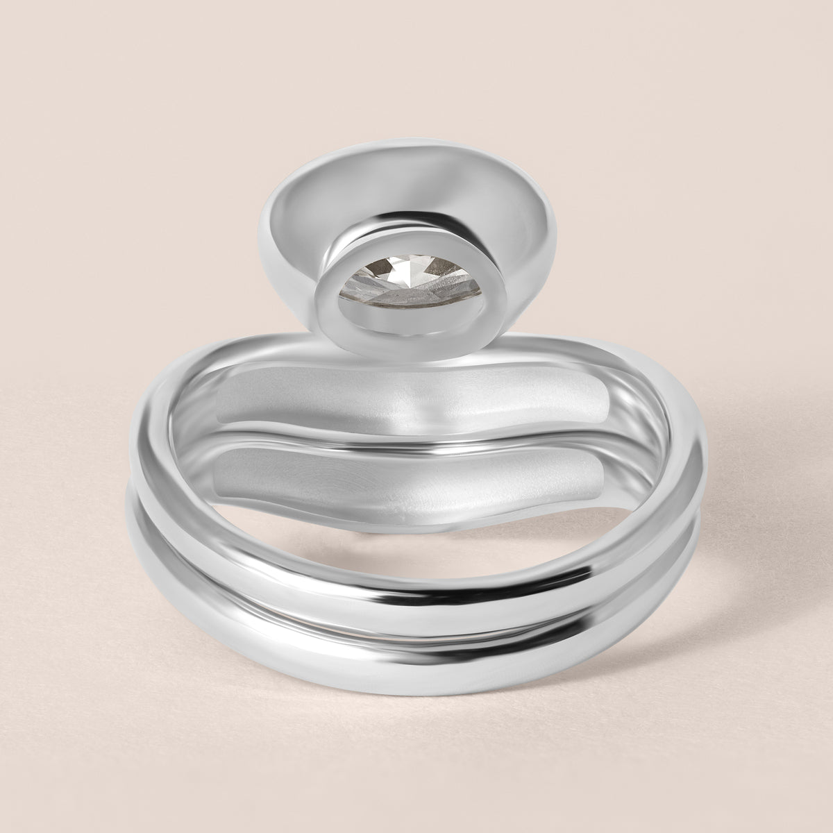Back view of Liora oval bezel engagement ring stacked with a diamond contour band in white gold or platinum showing structural depth.