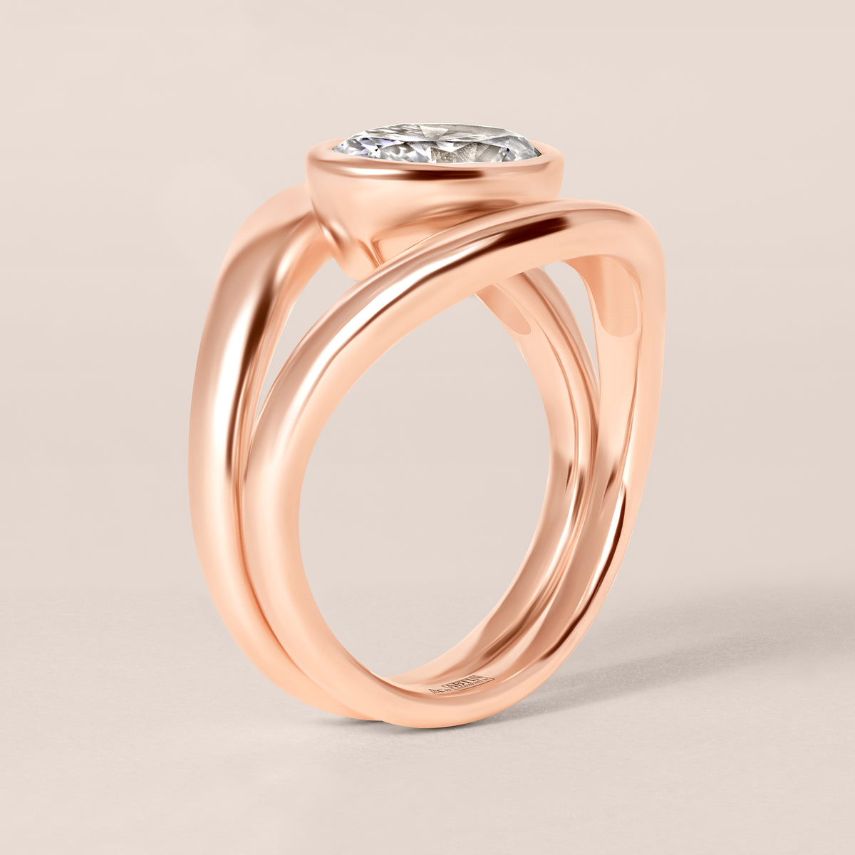 Side profile view of Liora oval bezel engagement ring stacked flush with a plain contour band in 18K rose gold.