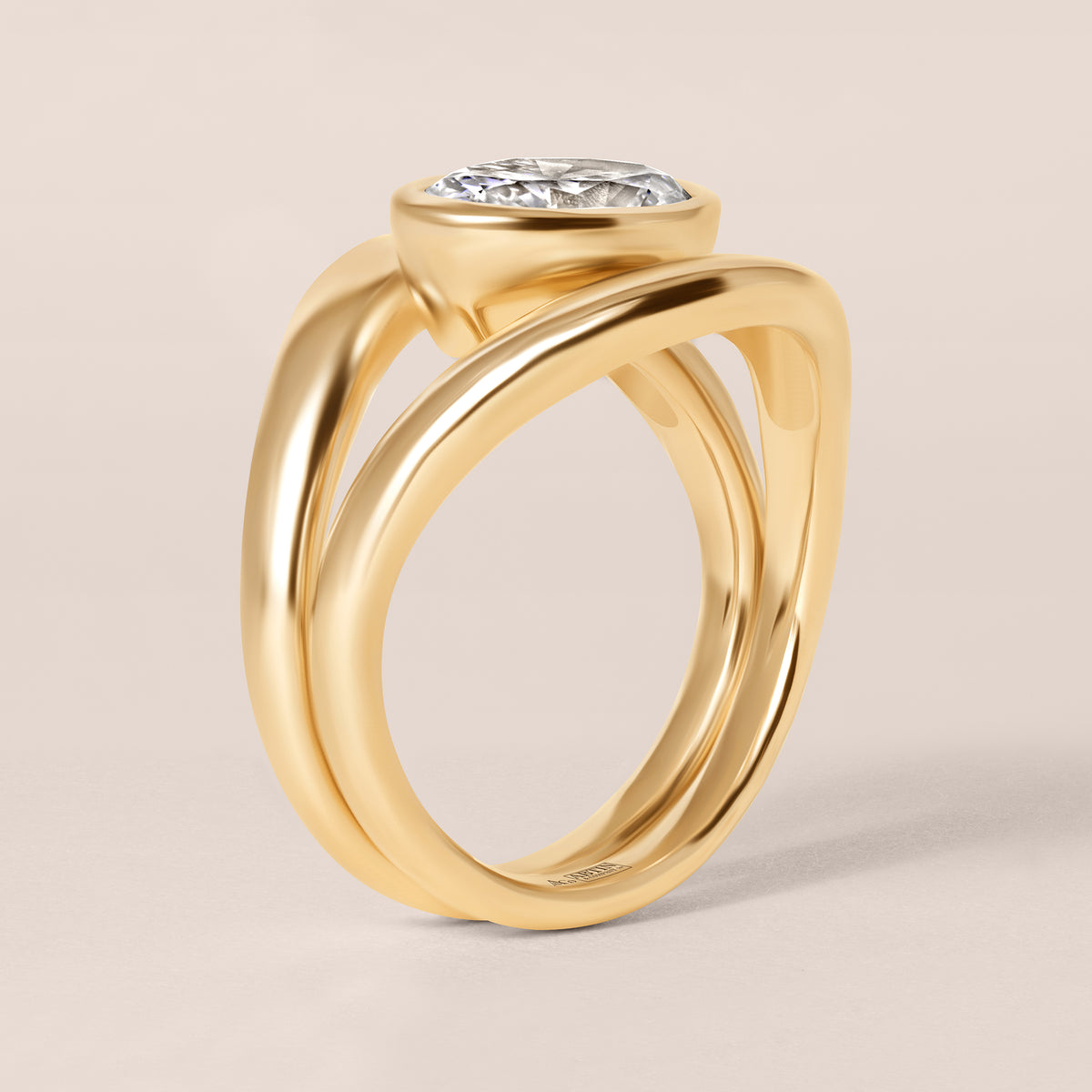 Side profile view of Liora oval bezel engagement ring in 18K rose gold highlighting the fluid architectural setting.