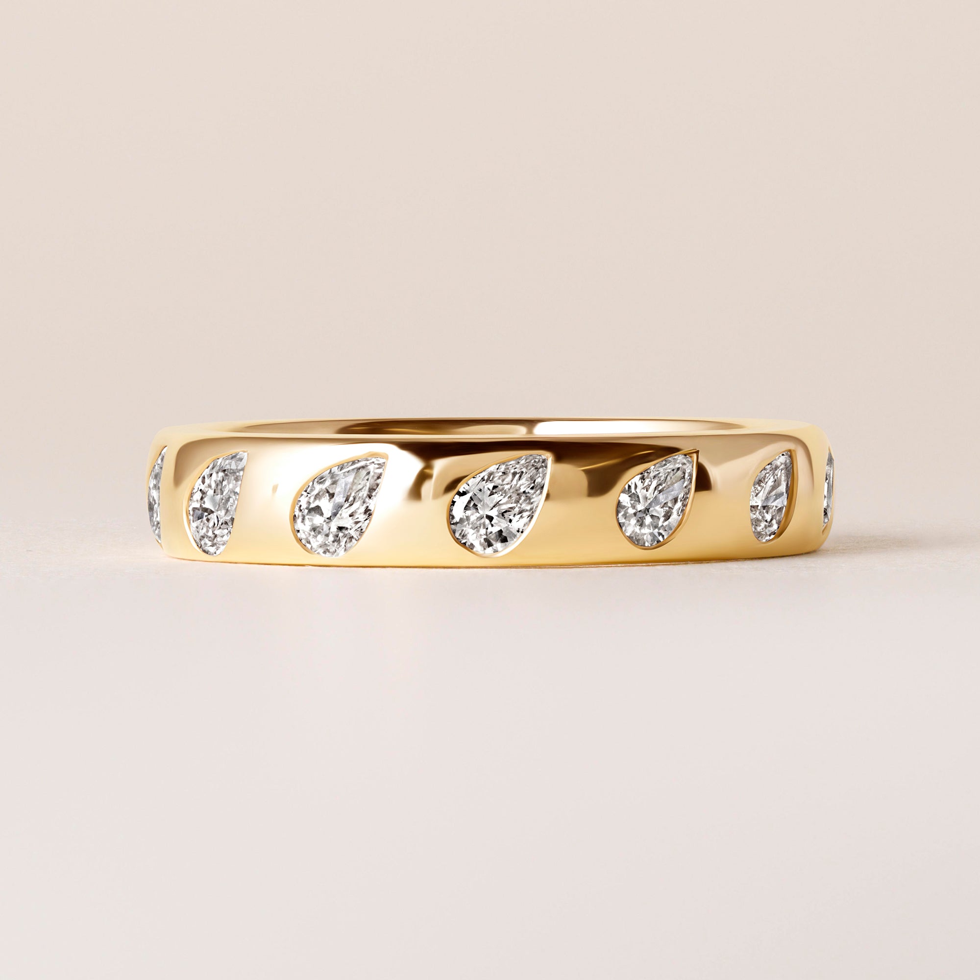 Dome Dot Flush Set Tilted Pear Diamond Ring