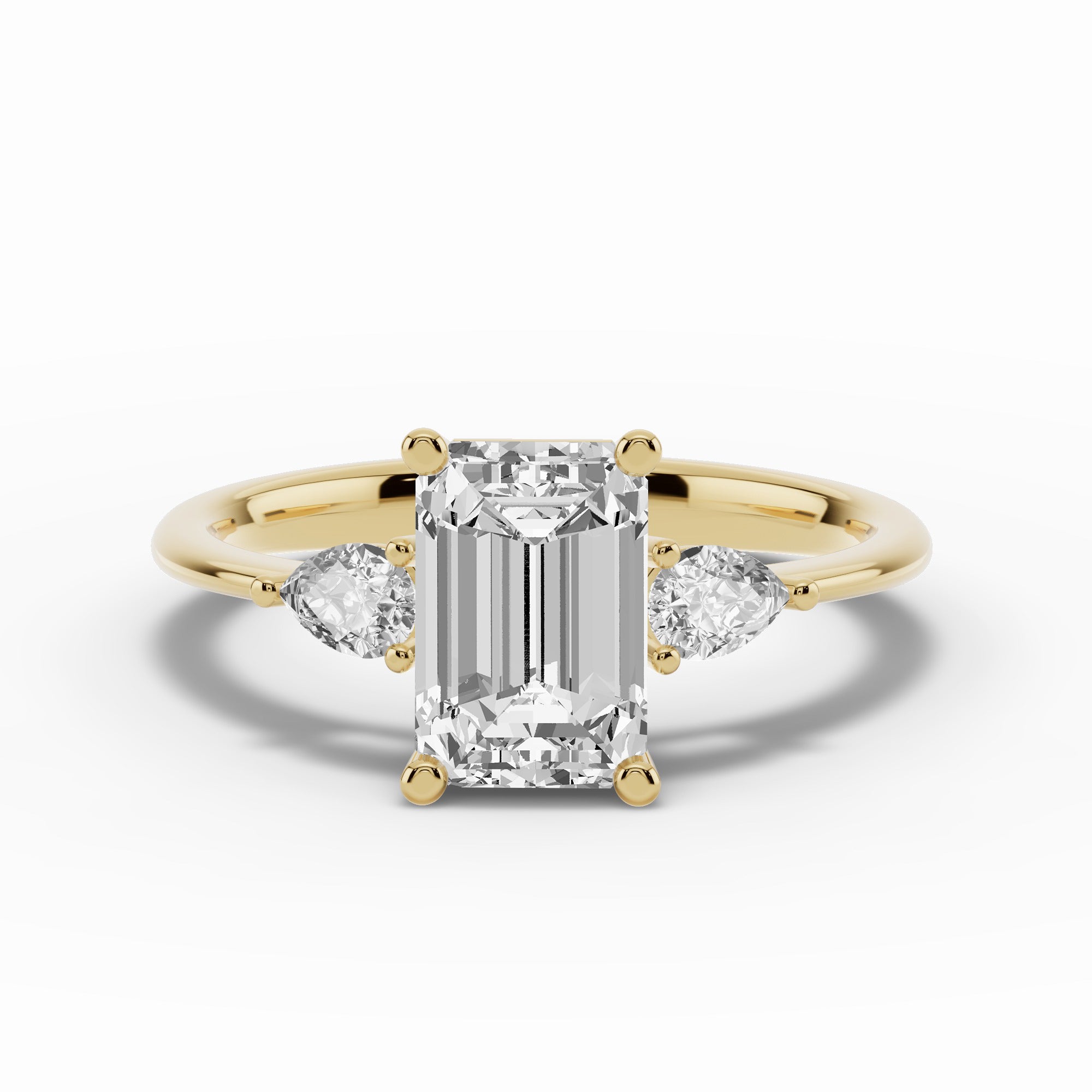 Vionne Emerald Cut Three-Stone Engagement Ring
