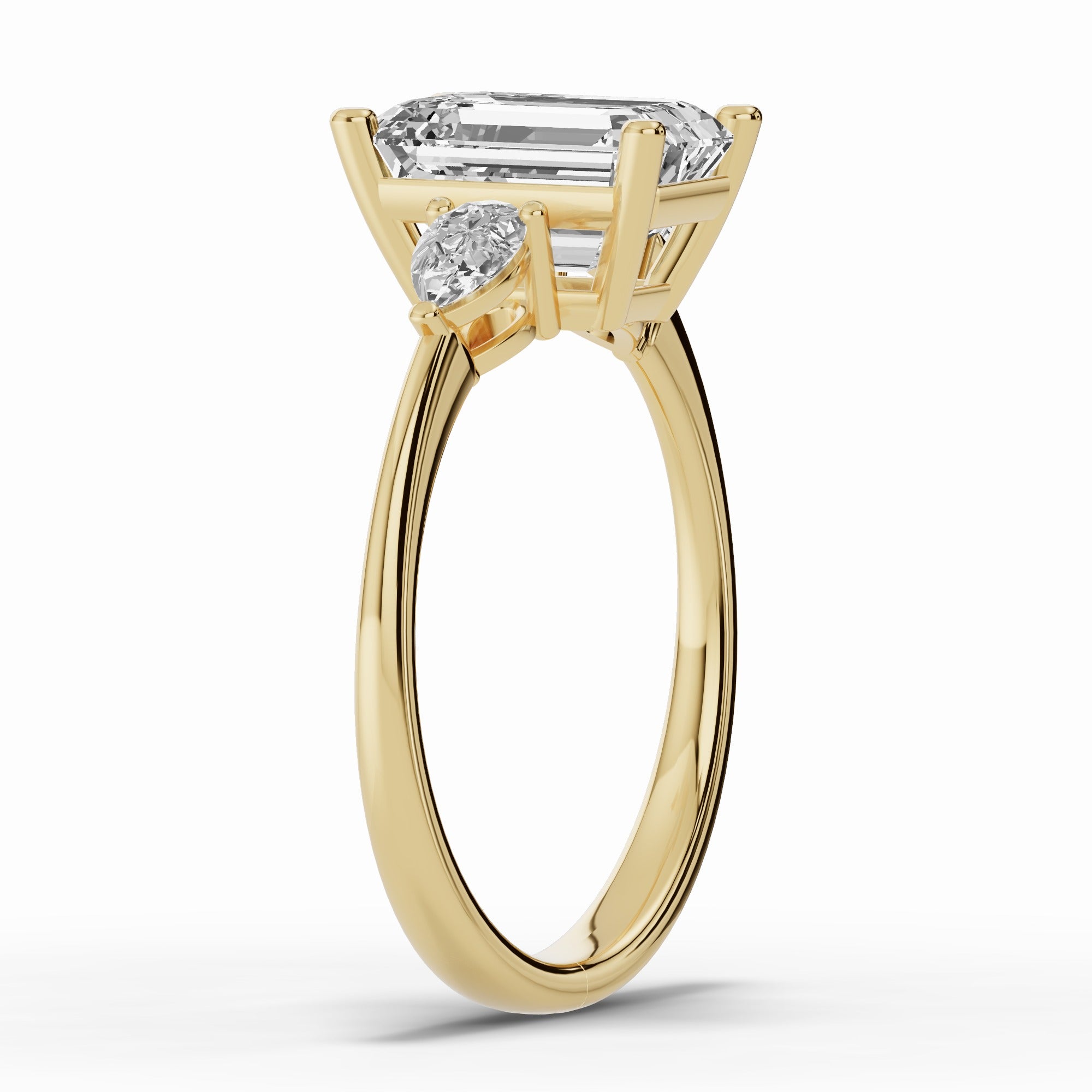 Vionne Emerald Cut Three-Stone Engagement Ring